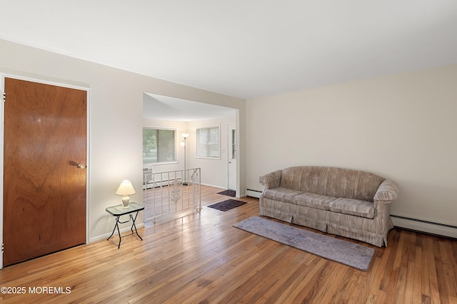 9D Dove St, Manchester, NJ 08759 - sitting room featuring a baseboard radiator and wood finished floors