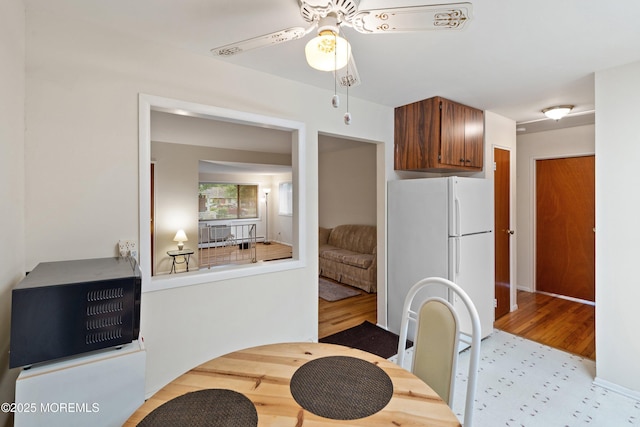 9D Dove St, Manchester, NJ 08759 - dining area featuring ceiling fan and light wood-type flooring