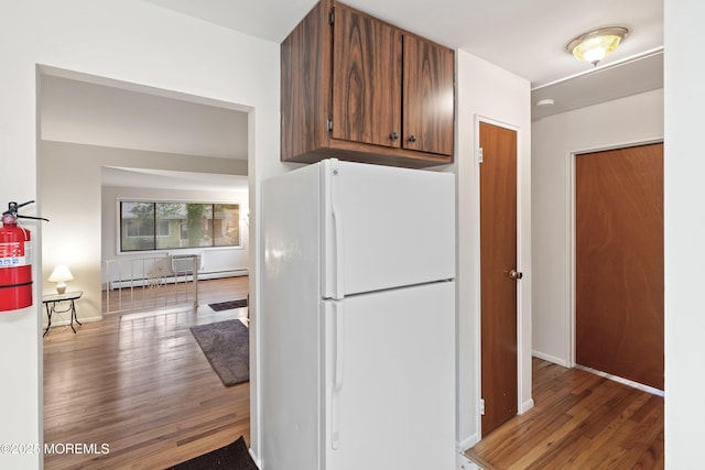 9D Dove St, Manchester, NJ 08759 - kitchen featuring freestanding refrigerator, wood finished floors, and baseboards