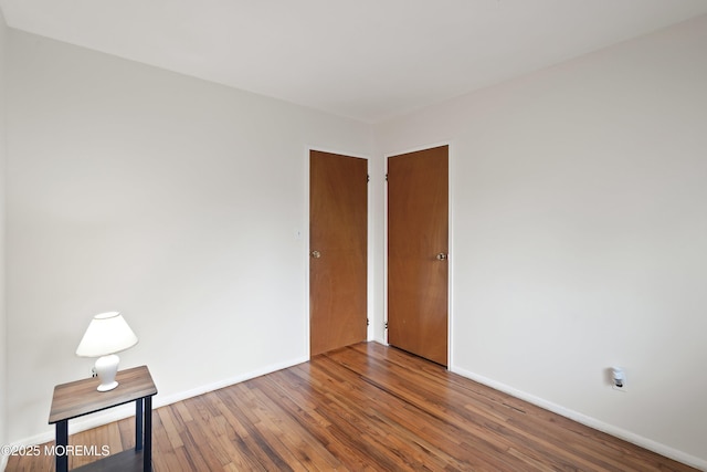 9D Dove St, Manchester, NJ 08759 - unfurnished room featuring baseboards and wood finished floors