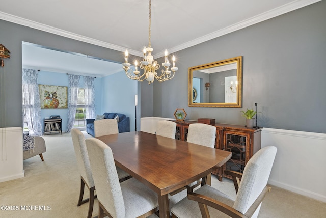 10 Butternut Ln, Bayville, NJ 08721 - dining space featuring light carpet, a chandelier, crown molding, and baseboards