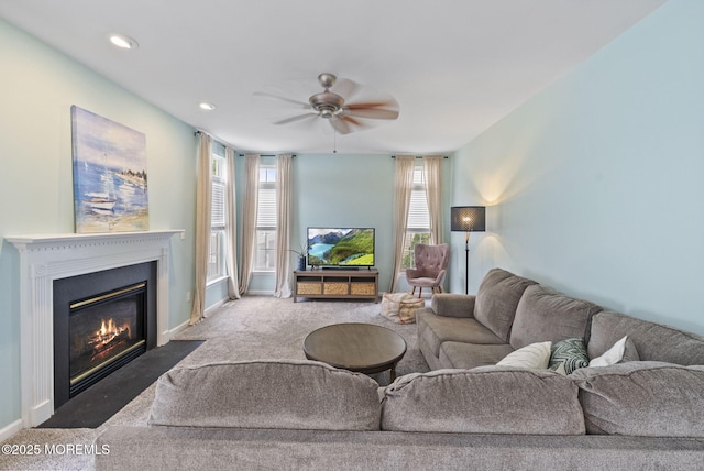 10 Butternut Ln, Bayville, NJ 08721 - carpeted living room featuring ceiling fan, a fireplace with flush hearth, and baseboards