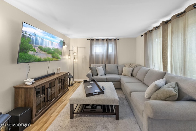 69 Helen Ave, Freehold, NJ 07728 - living room with light wood-style flooring