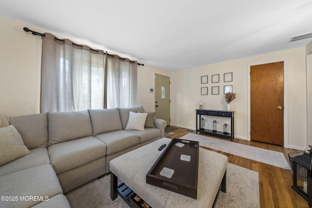 69 Helen Ave, Freehold, NJ 07728 - living area featuring wood finished floors and baseboards