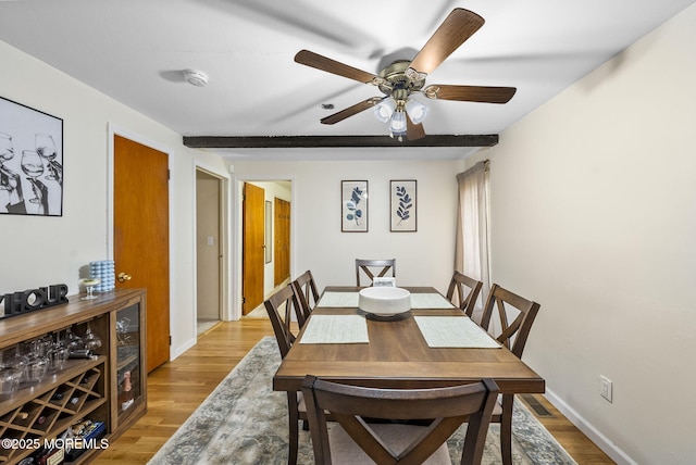 69 Helen Ave, Freehold, NJ 07728 - dining area with light wood-style flooring, ceiling fan, and baseboards