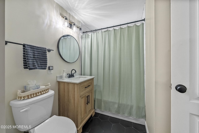 69 Helen Ave, Freehold, NJ 07728 - full bath with tile patterned floors, vanity, toilet, and shower / bathtub combination with curtain