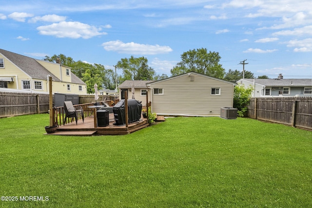 69 Helen Ave, Freehold, NJ 07728 - back of property with a deck and central AC