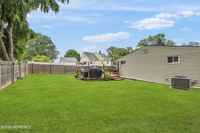 69 Helen Ave, Freehold, NJ 07728 - view of yard featuring central AC and a wooden deck