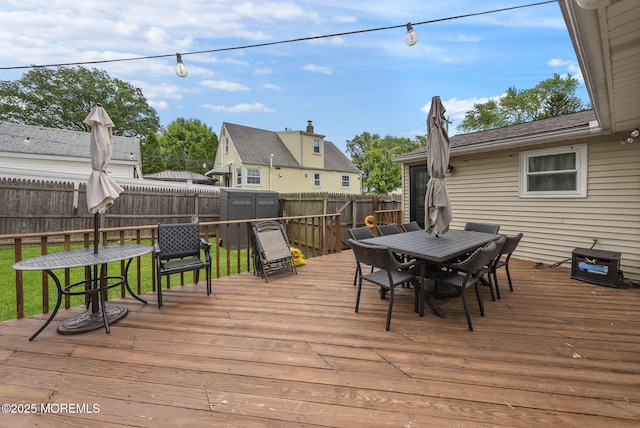 69 Helen Ave, Freehold, NJ 07728 - wooden deck featuring outdoor dining space