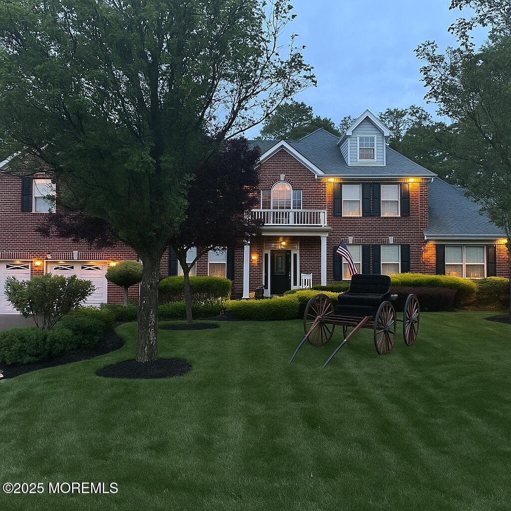 78 Vicari Way, Little Egg Harbor, NJ 08087 - back of house with a balcony, brick siding, and a yard