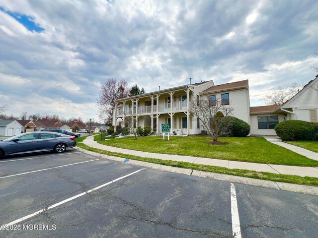 35 Wycoff Way E Unit 35, East Brunswick, NJ 08816 - view of property with uncovered parking