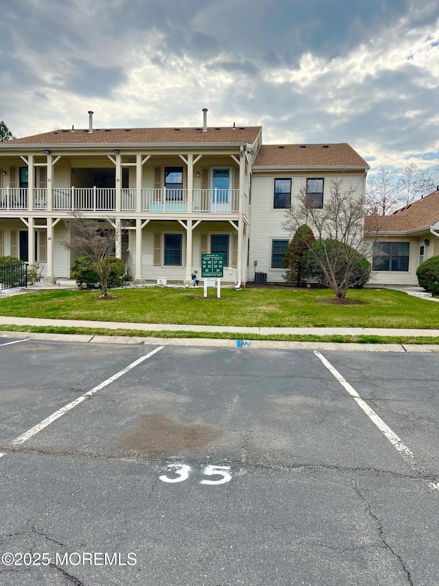 35 Wycoff Way E Unit 35, East Brunswick, NJ 08816 - view of building exterior with uncovered parking