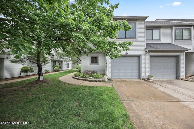 70 Lexington Cir, Matawan, NJ 07747 - townhome / multi-family property with an attached garage, driveway, a front yard, and a shingled roof