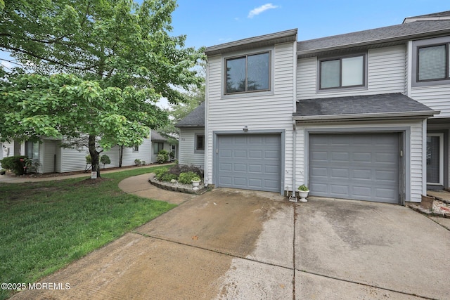 70 Lexington Cir, Matawan, NJ 07747 - view of property with roof with shingles, concrete driveway, an attached garage, and a front yard