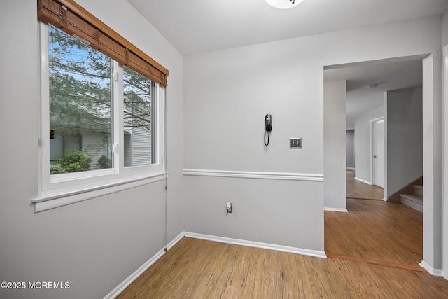 70 Lexington Cir, Matawan, NJ 07747 - unfurnished room featuring wood finished floors and baseboards