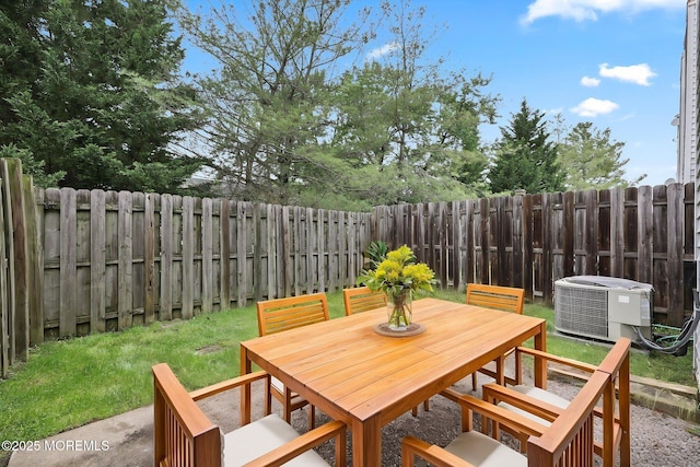 70 Lexington Cir, Matawan, NJ 07747 - view of patio with central air condition unit and outdoor dining area
