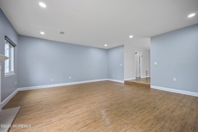 70 Lexington Cir, Matawan, NJ 07747 - unfurnished room with recessed lighting, baseboards, and wood finished floors