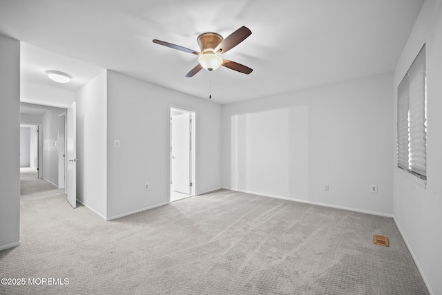 70 Lexington Cir, Matawan, NJ 07747 - unfurnished bedroom with carpet, baseboards, and a ceiling fan