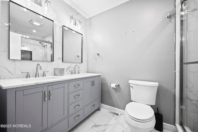 70 Lexington Cir, Matawan, NJ 07747 - full bathroom featuring marble finish flooring, double vanity, a stall shower, toilet, and baseboards