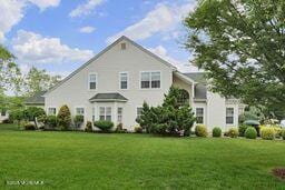 118 Timber Hill Dr, Monroe, NJ 08831 - view of front of house with a front lawn