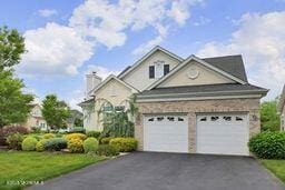 118 Timber Hill Dr, Monroe, NJ 08831 - view of front facade featuring asphalt driveway and an attached garage