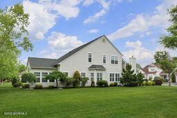 118 Timber Hill Dr, Monroe, NJ 08831 - back of property featuring a yard
