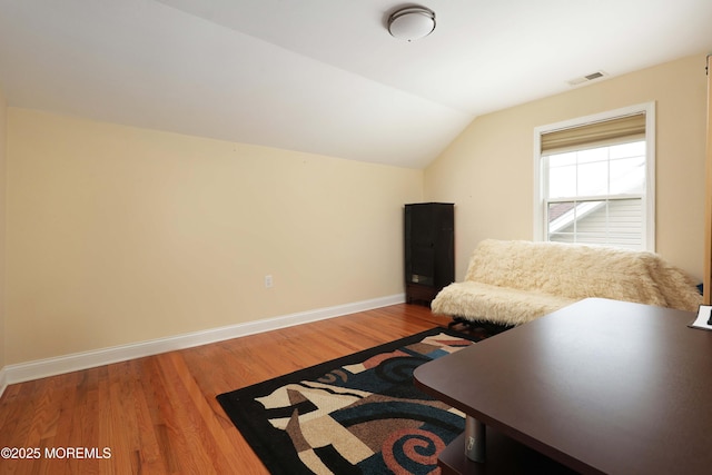118 Timber Hill Dr, Monroe, NJ 08831 - sitting room featuring wood finished floors, baseboards, and lofted ceiling
