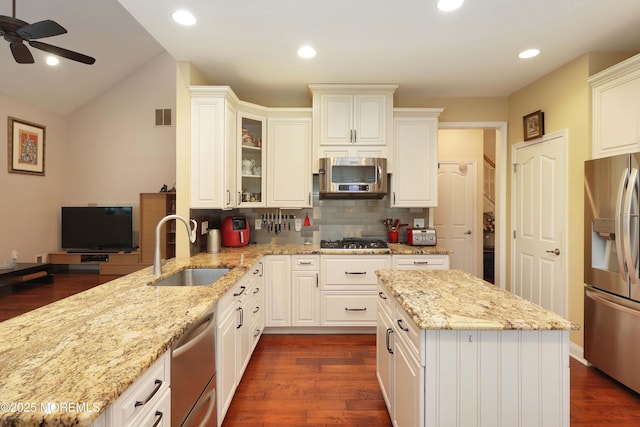 118 Timber Hill Dr, Monroe, NJ 08831 - kitchen with stainless steel appliances, a sink, ceiling fan, light stone counters, and tasteful backsplash