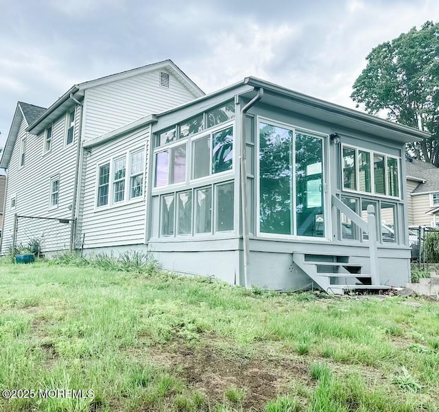 219 Hyers St, Toms River, NJ 08753 - view of property exterior featuring a sunroom