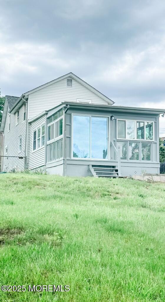 219 Hyers St, Toms River, NJ 08753 - view of front of house featuring a sunroom