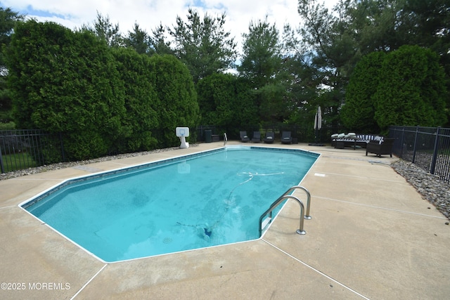 1492 Samuel Dr, Wall, NJ 07719 - view of pool with a patio, outdoor lounge area, and view of scattered trees