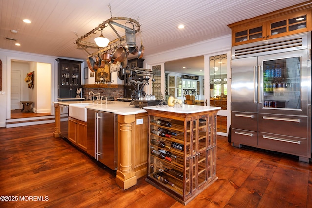 1 Beechwood Ter, Matawan, NJ 07747 - kitchen featuring stainless steel built in fridge, a sink, ornamental molding, glass insert cabinets, and recessed lighting