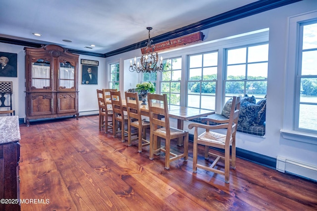 1 Beechwood Ter, Matawan, NJ 07747 - dining area featuring a chandelier, plenty of natural light, dark wood finished floors, ornamental molding, and a baseboard heating unit