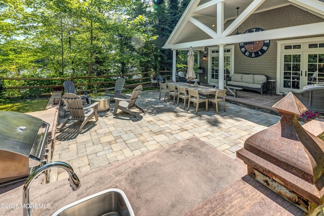 1 Beechwood Ter, Matawan, NJ 07747 - view of patio with outdoor dining space, french doors, an outdoor living space with a fire pit, a sink, and a grill