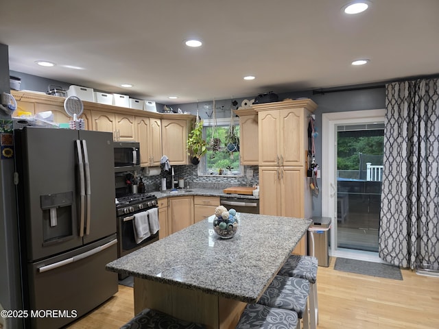 19 Fordham Rd, Jackson, NJ 08527 - kitchen featuring stainless steel appliances, light brown cabinetry, light stone countertops, recessed lighting, and light wood-type flooring