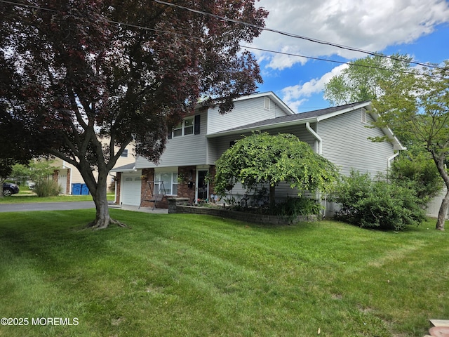 19 Fordham Rd, Jackson, NJ 08527 - view of front of home featuring a front lawn, driveway, and a garage