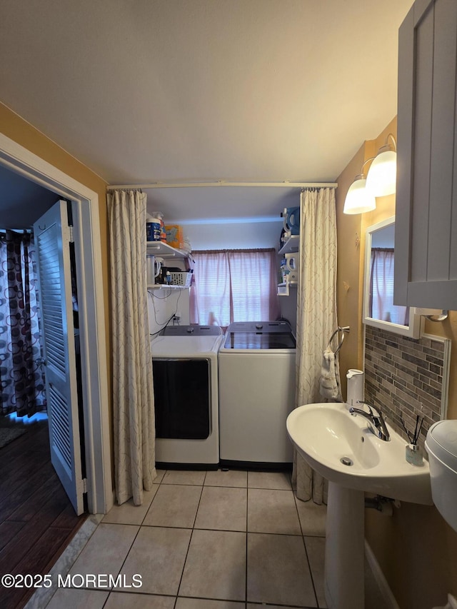 19 Fordham Rd, Jackson, NJ 08527 - bathroom featuring washer and dryer, backsplash, and tile patterned flooring