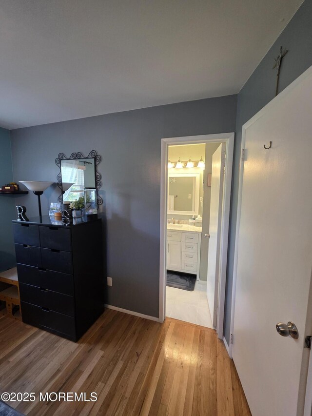 19 Fordham Rd, Jackson, NJ 08527 - bedroom featuring wood finished floors, a sink, and ensuite bathroom