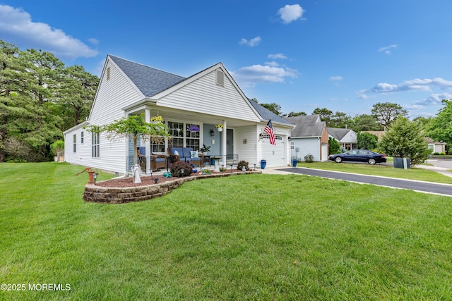 1 Sophia Ct, Toms River, NJ 08757 - view of front facade with covered porch, a front lawn, driveway, a garage, and roof with shingles