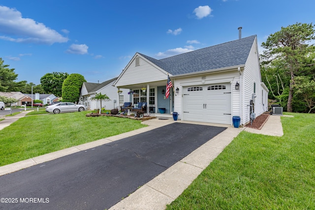 1 Sophia Ct, Toms River, NJ 08757 - view of front of house featuring an attached garage, central AC, a porch, and a front lawn