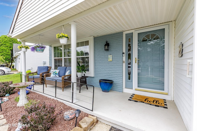 1 Sophia Ct, Toms River, NJ 08757 - entrance to property with covered porch and an outdoor living space