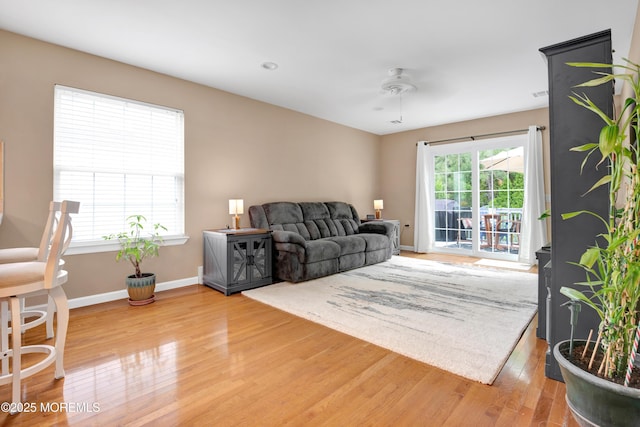 1 Sophia Ct, Toms River, NJ 08757 - living area with light wood-style floors, a ceiling fan, and baseboards
