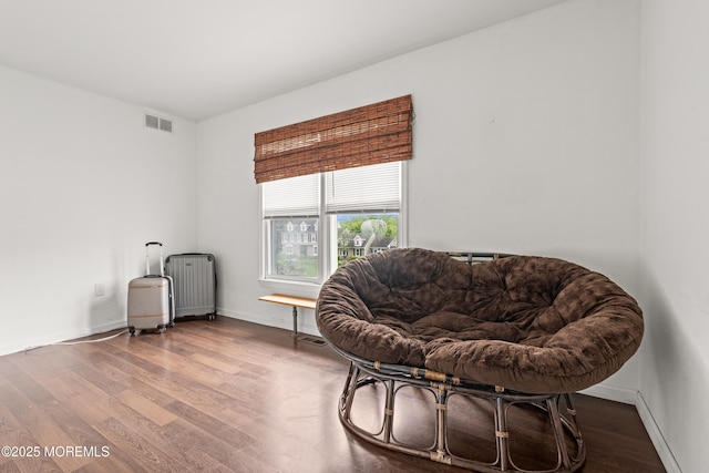 3404 Sandpiper Way, Allenwood, NJ 08720 - sitting room featuring radiator heating unit, wood finished floors, and baseboards