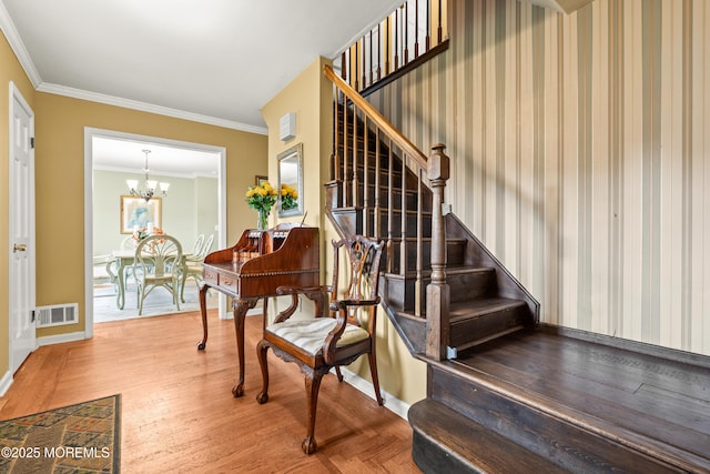 3404 Sandpiper Way, Allenwood, NJ 08720 - stairway featuring crown molding, a chandelier, and baseboards