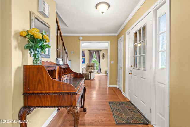 3404 Sandpiper Way, Allenwood, NJ 08720 - foyer featuring stairs, wood finished floors, crown molding, and baseboards