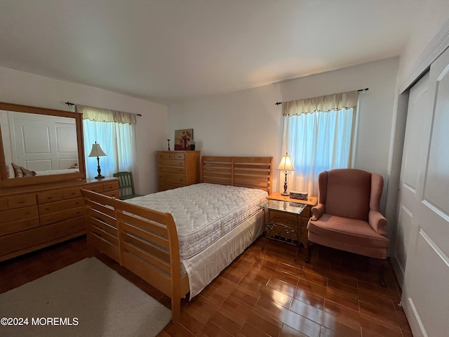 12 Mallard St Unit A, Manchester, NJ 08759 - bedroom with dark wood finished floors and a closet