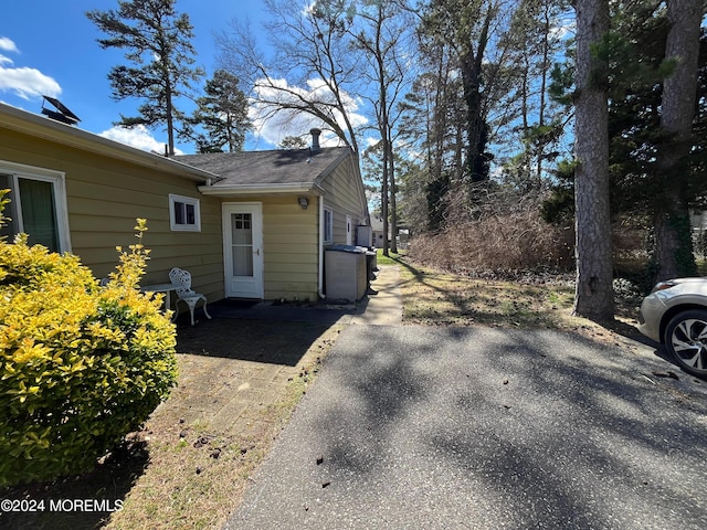 12 Mallard St Unit A, Manchester, NJ 08759 - view of side of home with roof with shingles