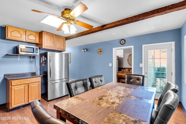 2419 Mallow St, Point Pleasant, NJ 08742 - dining area featuring light wood-type flooring, beamed ceiling, and a ceiling fan