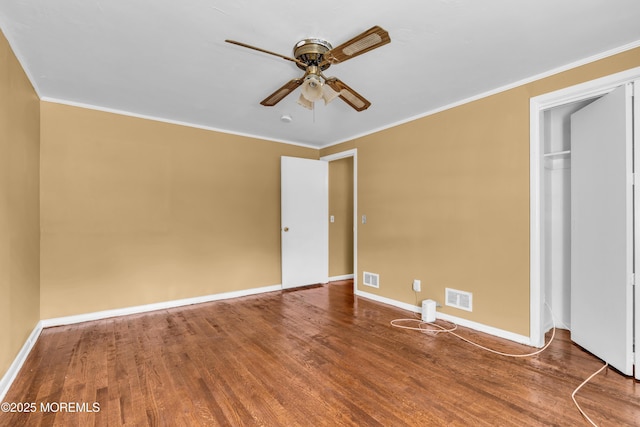 2419 Mallow St, Point Pleasant, NJ 08742 - unfurnished bedroom with wood finished floors, baseboards, ornamental molding, a closet, and a ceiling fan