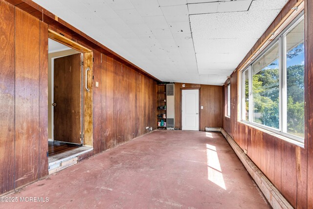 2419 Mallow St, Point Pleasant, NJ 08742 - unfurnished sunroom featuring a baseboard radiator